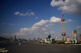 Skyline of Modern Shanghai on Sunny Day Featuring Iconic Oriental Pearl Tower on Shore of Huangpu River, Shanghai, China